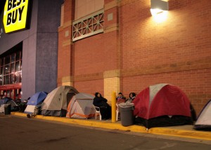 Customers camp out in front of a Minnesota Best Buy store for Black Friday bargains.
